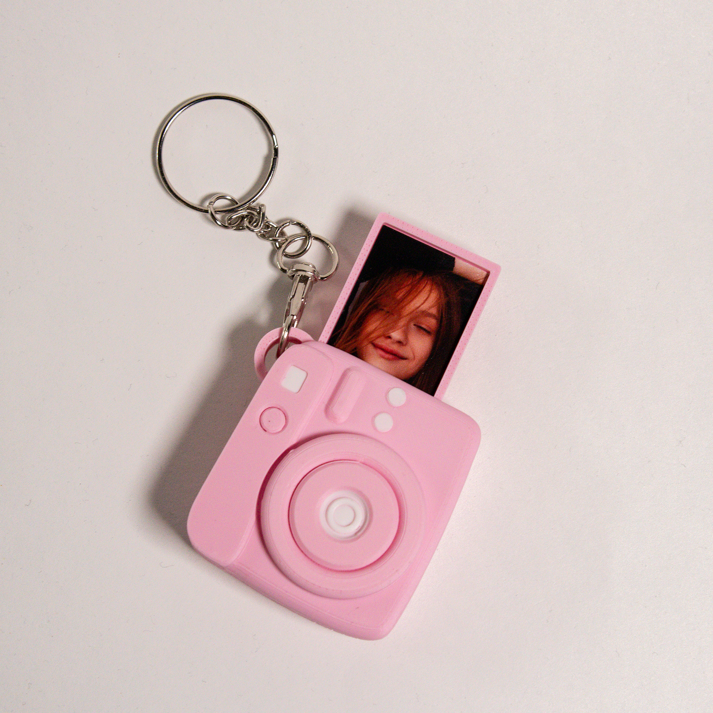 Kamera-avaimenperä omalla kuvalla