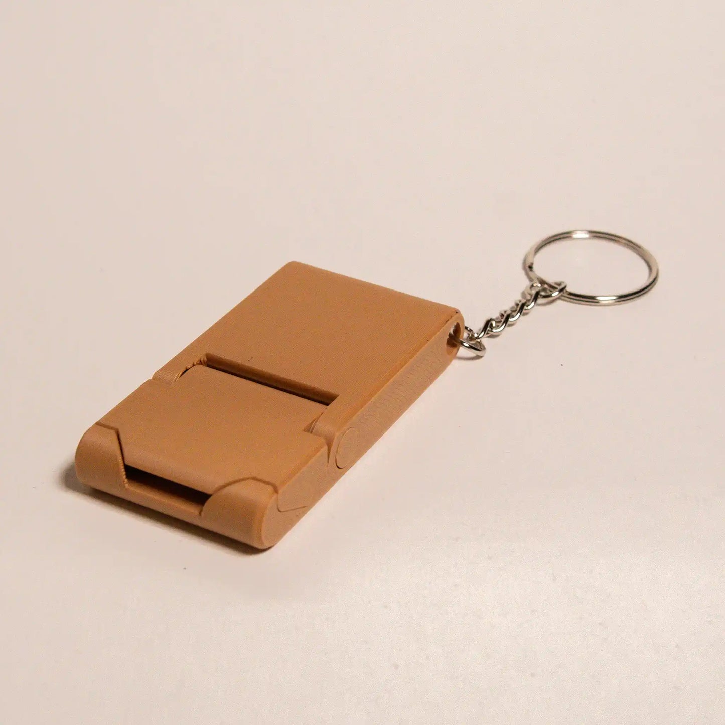 Kompakti puhelinteline avaimenperällä