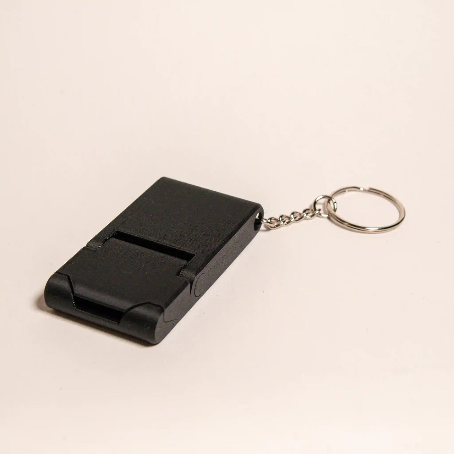 Kompakti puhelinteline avaimenperällä