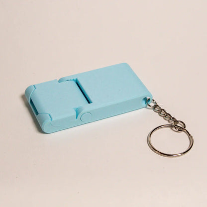 Kompakti puhelinteline avaimenperällä