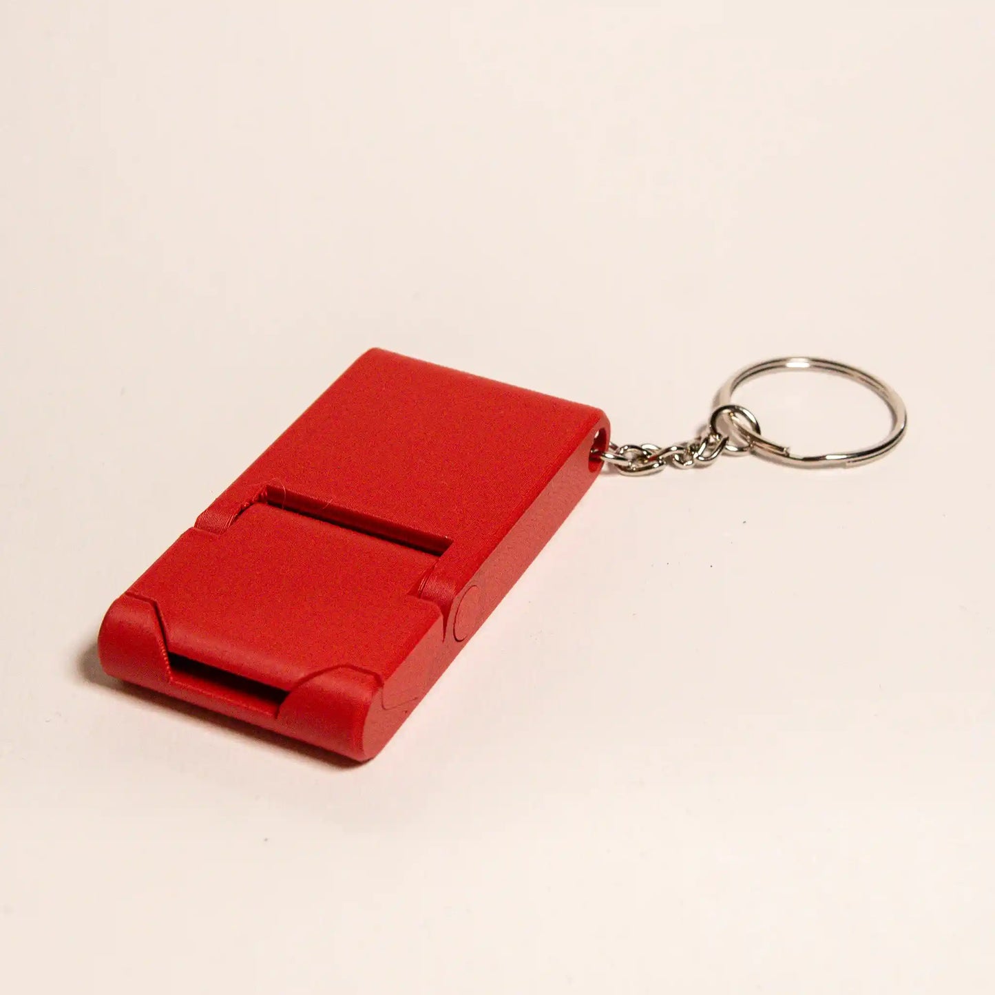 Kompakti puhelinteline avaimenperällä